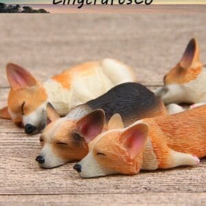 Four small, realistic corgi figurines sleeping on a wooden surface, under the LingcraftsCo logo.