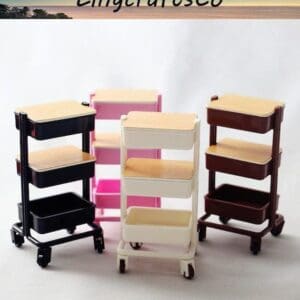 Four mini trolley carts in black, pink, white, and brown with wooden tops on wheels, displayed on a white background.