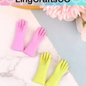 Two pink and two yellow miniature rubber gloves on a pastel surface with "LingCraftsCO" text above.