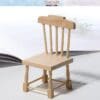 Wooden miniature chair on a light background, with "Stone Tower Miniature" logo above.