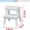 White miniature two-step stool with dimensions: 4.5cm tall, 4cm deep, and 3.8cm wide.