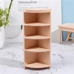 Miniature wooden corner shelf with four tiers on a marble surface, surrounded by minimalist decor.