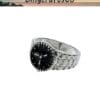 Silver adjustable bottle cap ring with black center features intricate clock design on face.
