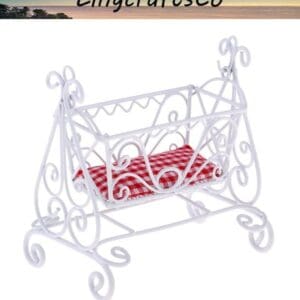 White metal doll cradle with intricate designs and red checkered cushion, branded by LingcraftsCo.