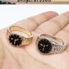 Two miniature clock rings, one gold and one silver, displayed on an open palm with a LingcraftsCo logo above.