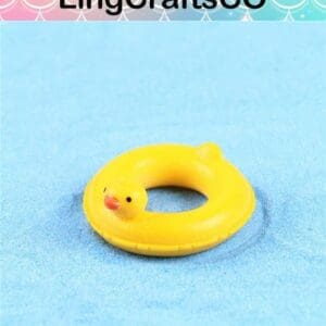 Yellow duck-shaped float ring on a blue background with LingCraftsCO logo above.