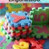 Colorful foam puzzle mats with numbers, stacked and scattered.
