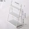 White, three-tier mini shelf with slatted design, measuring 75.5mm tall, 57.5mm wide, and 27mm deep. Weight: 5g.