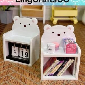 Two bear-shaped desk organizers, one with a calendar, the other with books and small items, on a wooden floor.