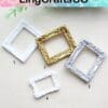 Four small decorative frames, including white, gold, and silver, numbered 1 to 4 on a light background.