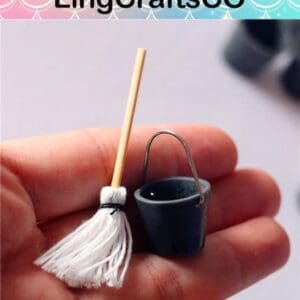 Miniature mop and bucket set on a person's hand, showing detailed craftsmanship by LingCraftsCO.