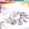 Tubes of colorful paint arranged in a circle on a white surface, with "LingCraftsCO" text above.
