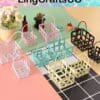 Colorful wire baskets in various sizes on a pastel background with flowers and miniatures.