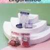 Miniature soap bars in packaged displays on white tiered platforms with colorful background, branded LingCraftsCO.