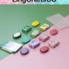 Mini soap replicas and boxes on a pink and green background, showcasing colorful packaging and designs.