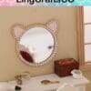 Round cat-ear mirror with rhinestone border on a decorated wall with miniature items, seen under the LingCraftsCO banner.