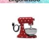 Red polka dot stand mixer with plugged-in cord, against a plain background.
