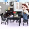 Miniature doll in a cozy room with a table, chairs, books, and flowers, featuring a guitar and clock decorations.