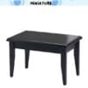 Black miniature table with sleek design and four tapered legs against a white background.